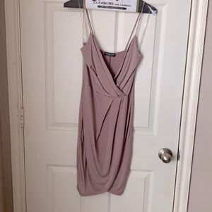 Mauve polyester dress. Above knew. Asymmetrical.